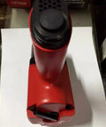 Top view of Bang For Your Buck CP 7625 Pneumatic Impact Wrench with red casing and controls for dual speed adjustment.