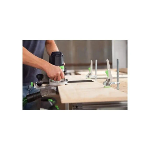 Plunge Router Of 1400 EQ-F-Plus With Ergonomic Grip in use on wooden board, showing precise depth scale and smooth depth adjustment in woodworking.