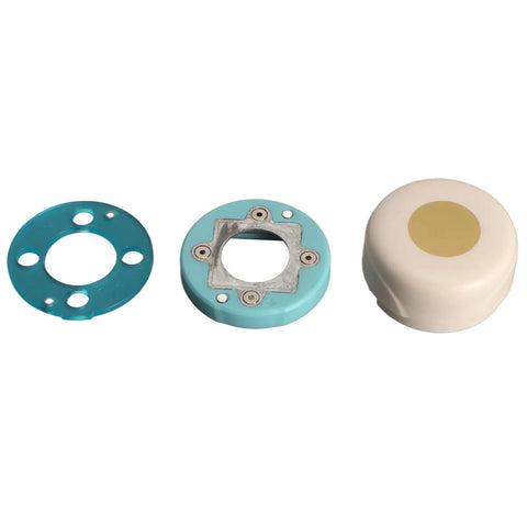 Components of turquoise magnetic craft hole punch with precise positioning for DIY projects and card making