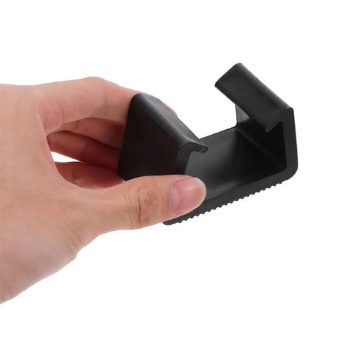 Hand holding 4 Piece Patio Furniture Clip Fasteners For Sofas And Chairs, Heavy Duty Plastic Clamps For Outdoor And Indoor Use