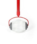 Roll Right Through Your Lawn With This Handy Dandy Nut Gatherer Roller scooping up acorns with ergonomic red handle.