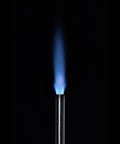 Reach Hose Torch With 5 Foot Hose, Trigger Start One Hand Operation showing high intensity swirl flame in dark setting