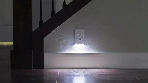Two Pack Wall Plate Night Lights LED Built Into Outlet Plates Duplex White Auto On Off shown installed near stairs.
