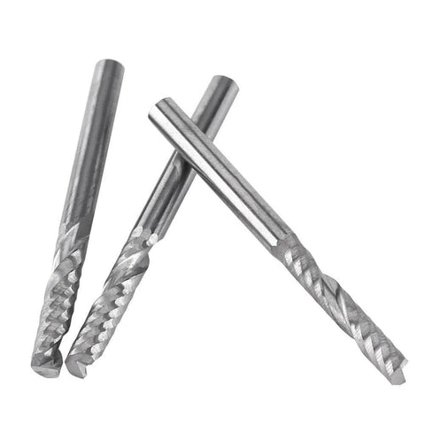 End mill bits, 1/8 in shank, tungsten carbide, single-flute; three pieces shown.