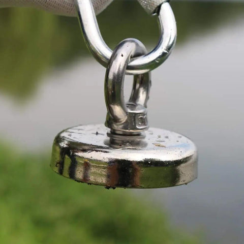 Close-up of shiny Beast 180lb Ultra Strong Fishing Magnet Kit with hook, used for river and outdoor magnetic fishing, 1.89 inch diameter.