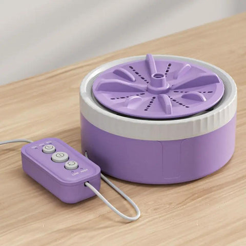 Portable Mini Washing Machine With USB Rechargeable Cordless Setup For Dorm And Travel Featuring Dual Turbine Agitator and Suction Base in purple on wooden surface.