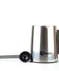 Silver and black Turkish Coffee Maker for 1 to 4 Cups Delivers Consistent Taste and Rich Foam with spoon on white background.