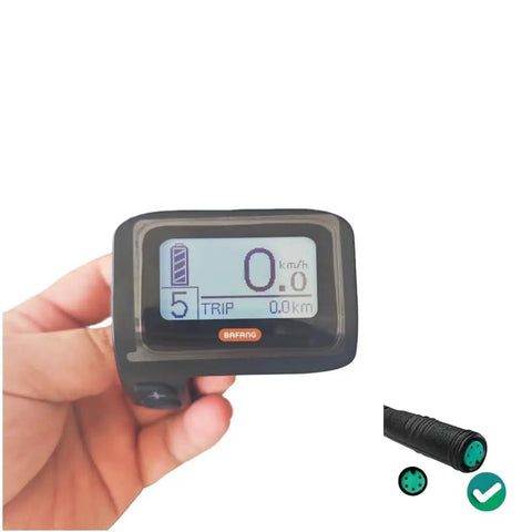 Electric Bike LCD Display Meter DPC11 Cycling Computer With UART Protocol And 5 Pin Waterproof Plug shown in hand