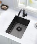 Undermount Bar Sink 12x16 Inch Deep Black 16 Gauge Stainless Steel Single Bowl With Bottom Grid And Drain Assembly installed in kitchen.