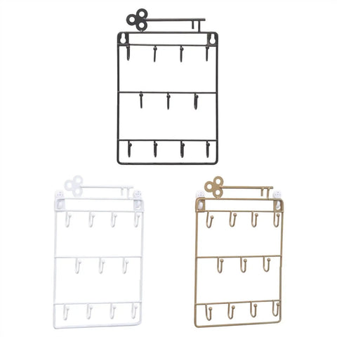 Heavy Duty Iron Wall Coat Rack With Eleven Sick And Sturdy Key And Bag Hooks For Front Door Organization in three colors.