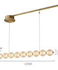 Modern Minimalist 9 Light Brass Magnetic Bean Pendant Lamp Sculptural Chandelier For Cafe Bar Home Decor Durable Build Smooth Even Glow Fresh Vibe Easy Install, 125cm length and 8cm height.