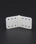 11x25.5 mm Pinned Nylon Hinge For RC Airplane Replacement, Small Folding Plane Hinges With 1.0 mm Pin, shown unfolded on dark background