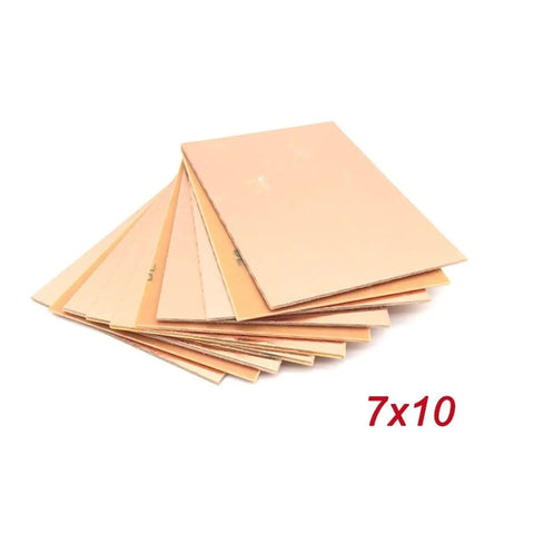 Stack of Single Sided Copper Clad Laminate PCB Kit Set Of 10 Pieces 7x10 cm DIY Circuit Boards For Prototyping, shown at angle