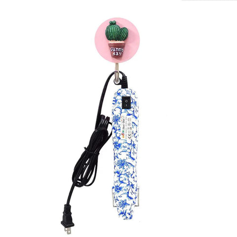 Dope Resin Heat Gun 300W With 6.6Ft Cable For Crafts And DIY Projects, blue floral design, coiled black cable, tabletop stand.