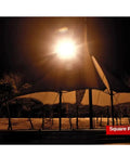 Heavy Duty Led Tower Floodlight Waterproof Job Site Search Lamp With Badass 1000 Watt Glow illuminating a park at night.
