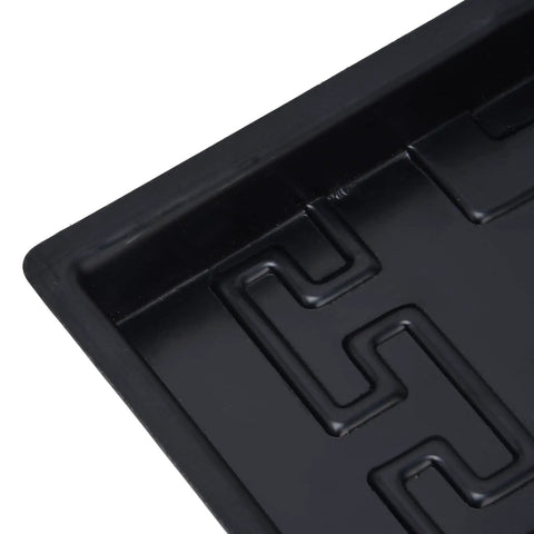 Close-up of Outdoor Stepping Stone Mold Kit For Concrete Paths, showing black ABS construction with geometric pattern.