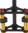 Close-up of black and gold 26 Inch Fat Bike Suspension Fork With 4.0 Inch Tire Clearance, 160mm Travel, double shoulder design.