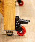 Heavy Duty Steel Caster Set For Router Tables, Workbenches, Cabinets And Tool Stands With 800 LB Capacity, showing foot pedal cam locking system
