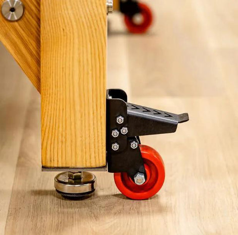 Heavy Duty Steel Caster Set For Router Tables, Workbenches, Cabinets And Tool Stands With 800 LB Capacity, showing foot pedal cam locking system
