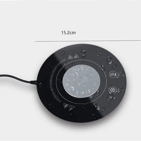 Fast Acting USB Mug Warmer With Smart Adjustable Heat Control Keeps Your Morning Sip Piping Hot All Day Long Sleek Black Tempered Glass Platform on a desk.
