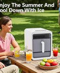 Savage Compact Nugget Ice Maker Countertop Speed Demon slays ice while friends enjoy drinks outdoors in summer.