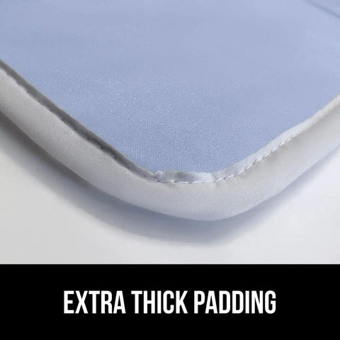 Close-up of the Magnetic Ironing Blanket Travel Size 28x24 with silicone coating, showing extra thick padding, in pink floral pattern.