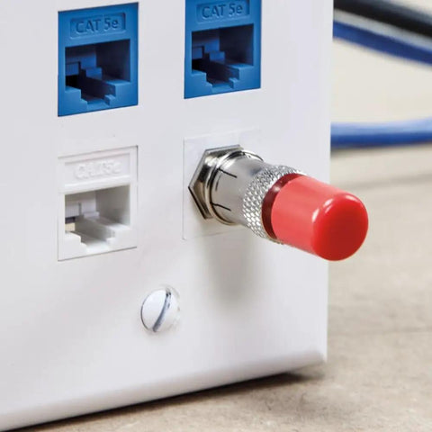 Close-up of coaxial adapter with red cap connected to panel, part of Remote Kit For Coax Explorer2 Tester With Snap On Remote Holder.