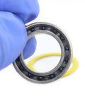 Ceramic Hybrid Radial Bearing For Bike Hubs 15x24x5mm with PA66 Cage and Ceramic Balls in gloved hand