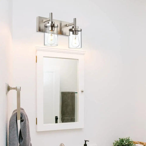 4 Light Brushed Nickel Bathroom Vanity Light Over Mirror With Clear Glass Shades, Industrial Wall Mount above white mirror