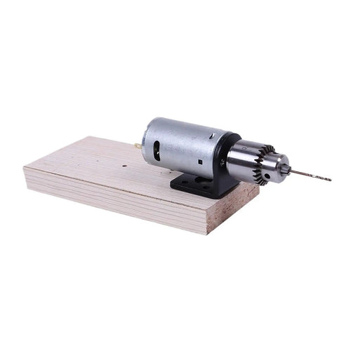 Compact Mini Drill Press And Bench Lathe Tool Set With Keyless Chuck Electric Motor for Wood Aluminum and Acrylic DIY Projects with motor on wood.