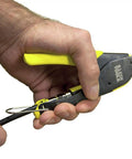 Person using Compact F Connector Compression Crimper for DIY cable installations with fixed plunger, comfort grips, and spring return.