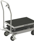 Rock Solid Hydraulic Lift Table Cart Two Speed Rolling Work Platform Supporting Five Hundred Pounds With No Sweat Height Adjustments For Busy Warehouses And Garages seen from a side angle with a sturdy black top and silver frame.