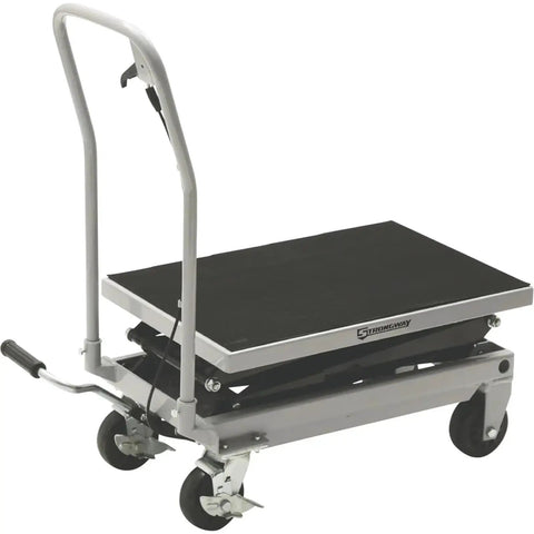 Rock Solid Hydraulic Lift Table Cart Two Speed Rolling Work Platform Supporting Five Hundred Pounds With No Sweat Height Adjustments For Busy Warehouses And Garages seen from a side angle with a sturdy black top and silver frame.