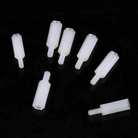 Zero Fuss Nylon Standoff Kit With M2.5 Hex Spacers And Male Female Bolt Nuts, clear nylon hex spacers on black background for electronics repair.