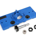 Blue plastic hinge boring jig with 35mm hole opener; includes drill guide, bracket, positioning rod and wrench.