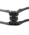 Close-up of black Carbon Fiber RC Crawler Chassis Frame Kit For LCG Axial SCX10 Capra 1 To 10 Scale With Rail And Skid Plate and Body Posts.