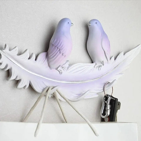 Creative Bird Wall Mounted Coat Rack No Sweat Entryway Setup Rock Solid Hooks For Coats Hats And Keys Easy DIY Mount Multi Room Home Storage Solution with purple birds on a leaf design.