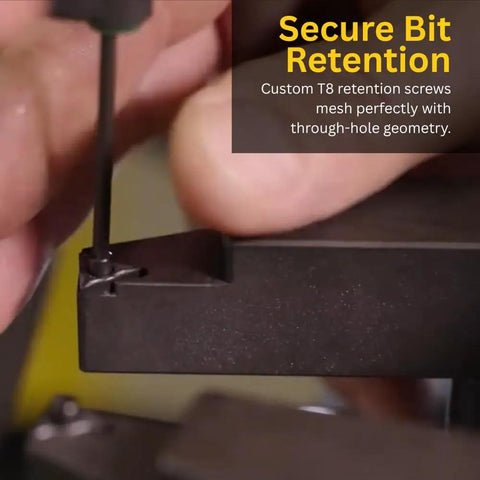 Close-up of T8 retention screw being installed in carbide insert tips with custom radius and chip breaker for rotor matching systems.