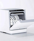 Nifty Countertop Dishwasher, Straight-Up Fast 40 Min Cycle, 5 Wash Options, Stainless Steel Tub, Auto Air Dry, Steam Baby Sanitize, Holds Six Place Settings, Total No Sweat Kitchen Staple with open door and dish rack.