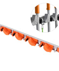 Wall Mounted Broom Holder With Heavy Duty Aluminum Hooks And Sturdy Abs Mounts For Garage Gear Storage And Hassle Free Cleanup Station Easy Install Mop Organizer Shelf Rack System with orange hooks.