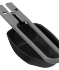 Black folding camping spoon with calibration marks, glove-friendly mechanism, ultra lightweight at 1 oz, compact 6 x 3 x 2 inches.