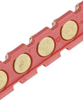 Close-up of Red Shot.27 Powder Actuated Fastener Cartridges Set Of Six for beefed-up construction jobs showing brass caps and red casing.