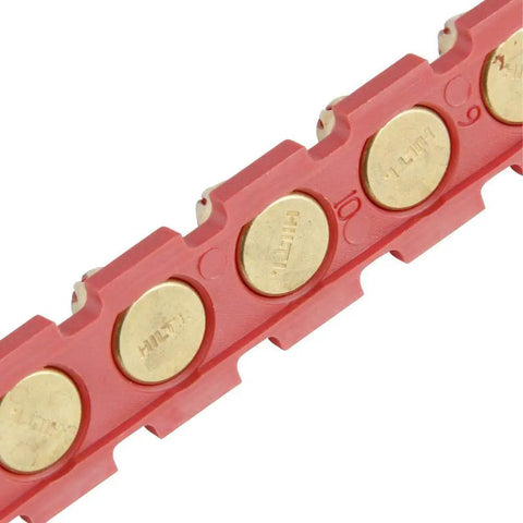 Close-up of Red Shot.27 Powder Actuated Fastener Cartridges Set Of Six for beefed-up construction jobs showing brass caps and red casing.