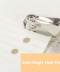 Handheld 6mm Circle Hole Punch Single Hole Puncher Metal Craft Punch Tool in use on paper, showing 6mm hole and non-slip grip