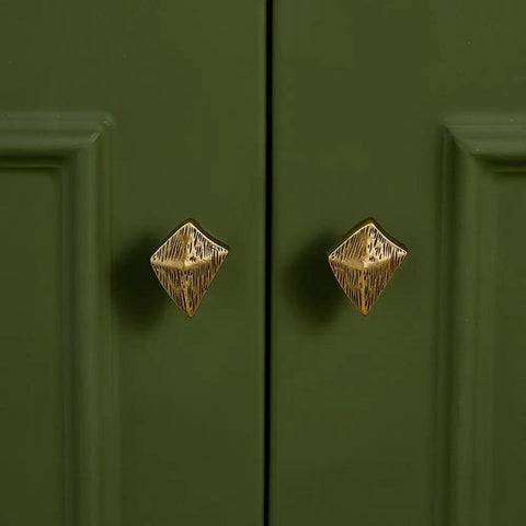 Antique Bronze Cabinet Knobs And Drawer Pulls Two Pack With Boho Geometric Silhouettes on green cupboard doors.