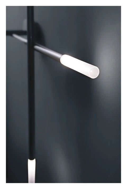 Modern Led Wall Sconce Crafted From Rust Resistant Metal With Soft Warm White Glow, close-up view of illuminated LED.