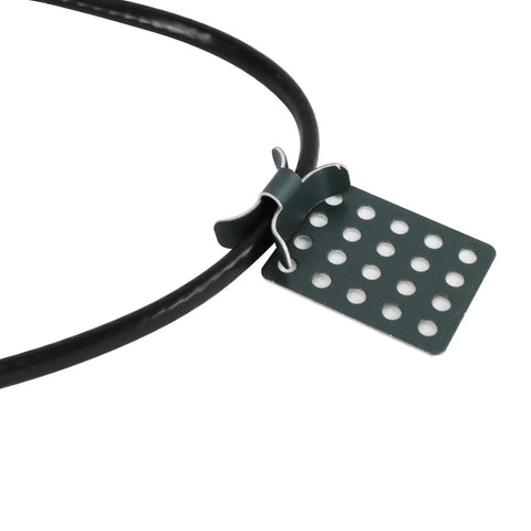 Rectangular perforated metal roof clip with a cable loop securing a black de-icing cable.