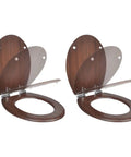 Heavy Duty Soft Close Toilet Seats Crafted From Dense Mdf Featuring Quiet Shutting And Rich Brown Hue For A Seamless Bathroom Glow Up That Is Truly Nailed To Perfection - two soft close toilet seats showing brown MDF material.