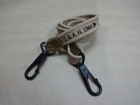 Heavy Duty 60 Inch Khaki Canvas Sling For Bren LMG With Dual Hook Quick Attach Two Snap Hooks Mil Spec Reenactment Gear Adjustable For Mk1 Mk2 Mk3 Tough As Nails showing khaki color and black hooks.