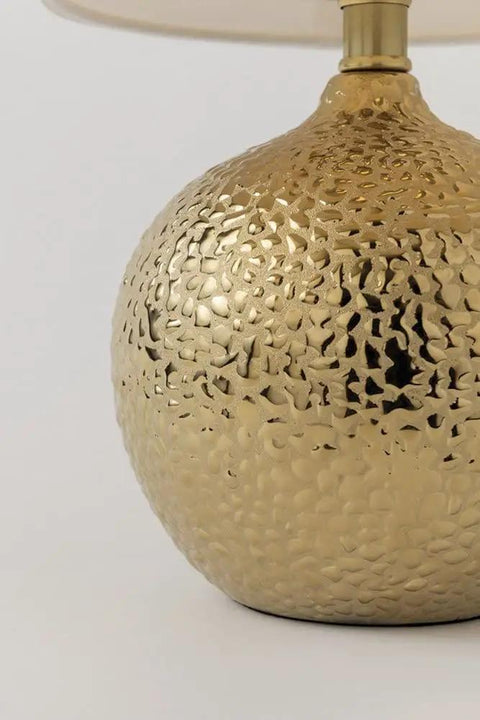 Close-up of textured gold base of Heather Table Lamp In Gold With Linen Shade, Modern End Table Lamp For Nightstand And Small Spaces.